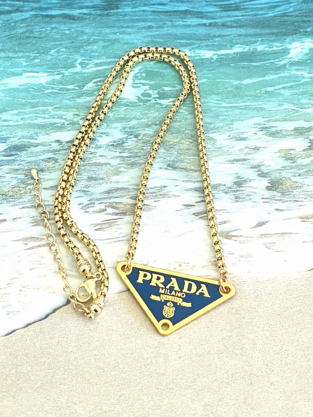 Unbranded Milano Triangle Logo Pendant Necklace in Gold & Blue Like New